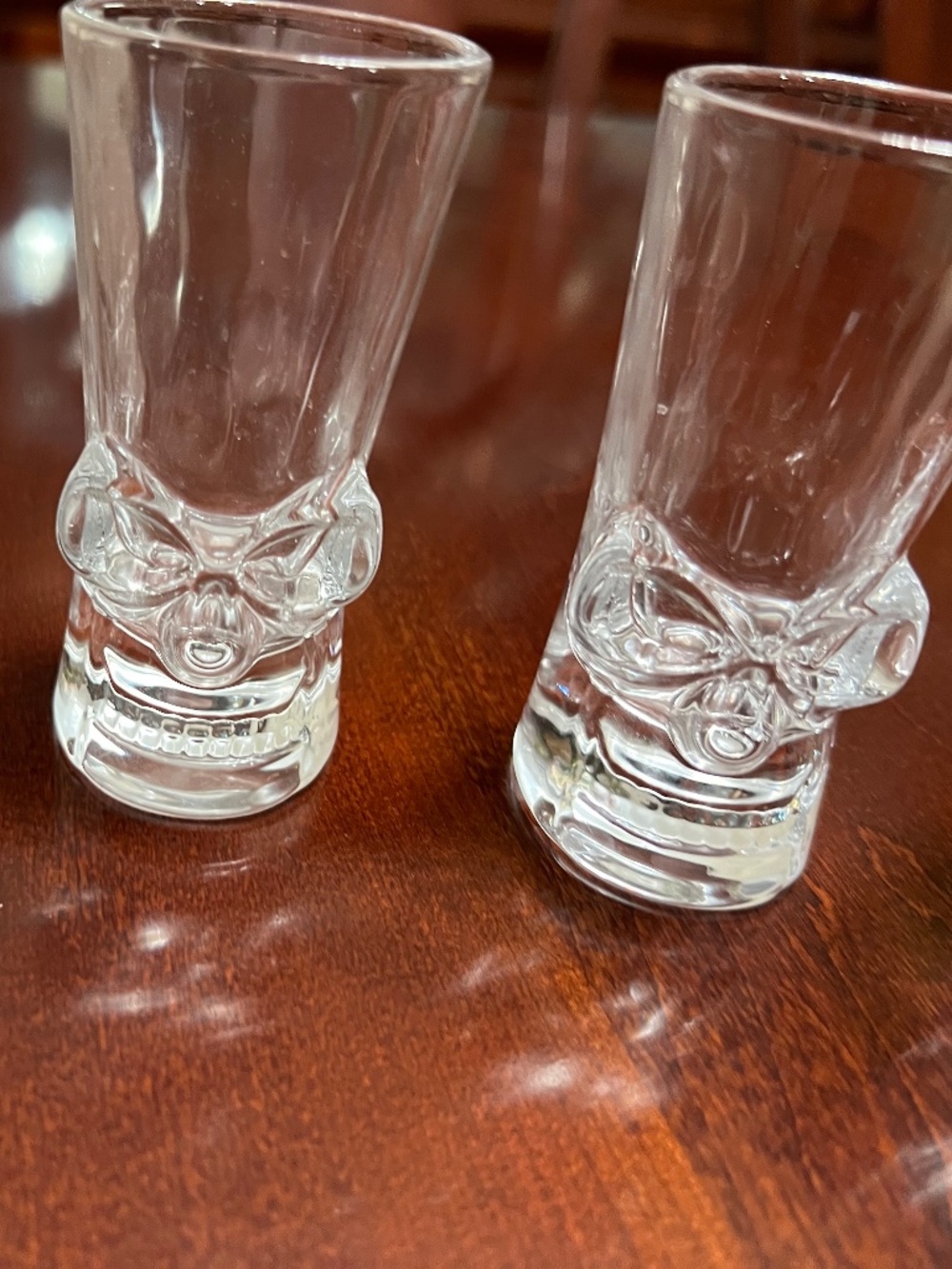 Set of 4 tall skull shot glasses